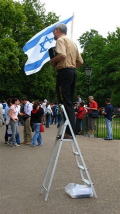 Speakers' Corner - He stands out as one of the many colourful speakers with his Israeli flag, bible and Jesus pants.