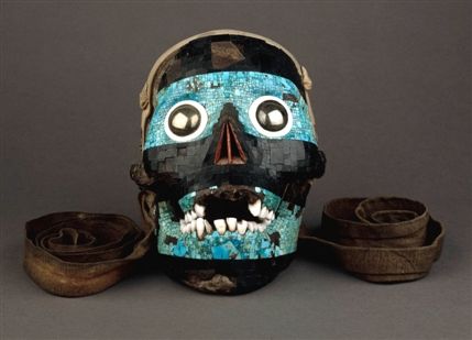 Moctezuma: Aztec Ruler - Mosaic mask of Tezcatlipoboca, one of the four powerful Aztec creator deities. Inlaid human skull with real teeth. Photo: Trustees of the British Museum