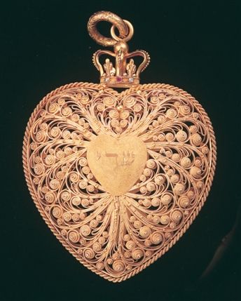 Jewish Museum - 19th century English amulet in the form of a heart locket with Hebrew characters. Credit: Jewish Museum London