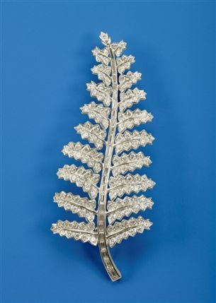 The State Rooms, Buckingham Palace - Diamond and platinum brooch in the form of a leaf of Silver Fern. Given to The Queen from the 'Women of Auckland', during the first Commonwealth Tour, 1953
