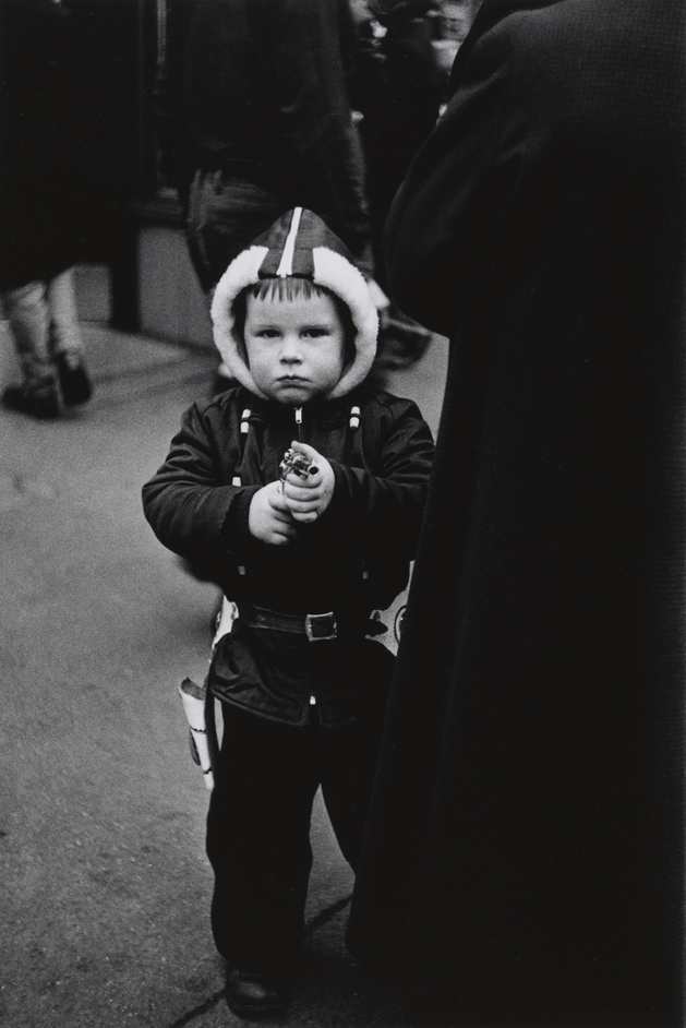 diane arbus: in the beginning - Kid in a hooded jacket aiming a gun, N.Y.C. 1957. Courtesy The Metropolitan Museum of Art, New York / � The Estate of Diane Arbus, LLC. All Rights Reserved